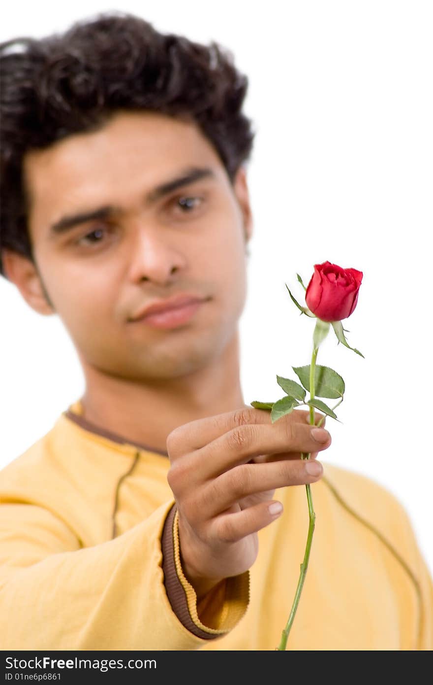 Young handsome man with red rose. Young handsome man with red rose