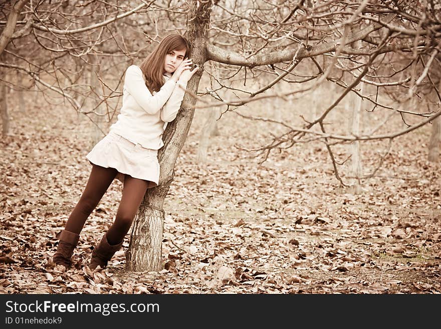 Young beauty in emotional portrait.