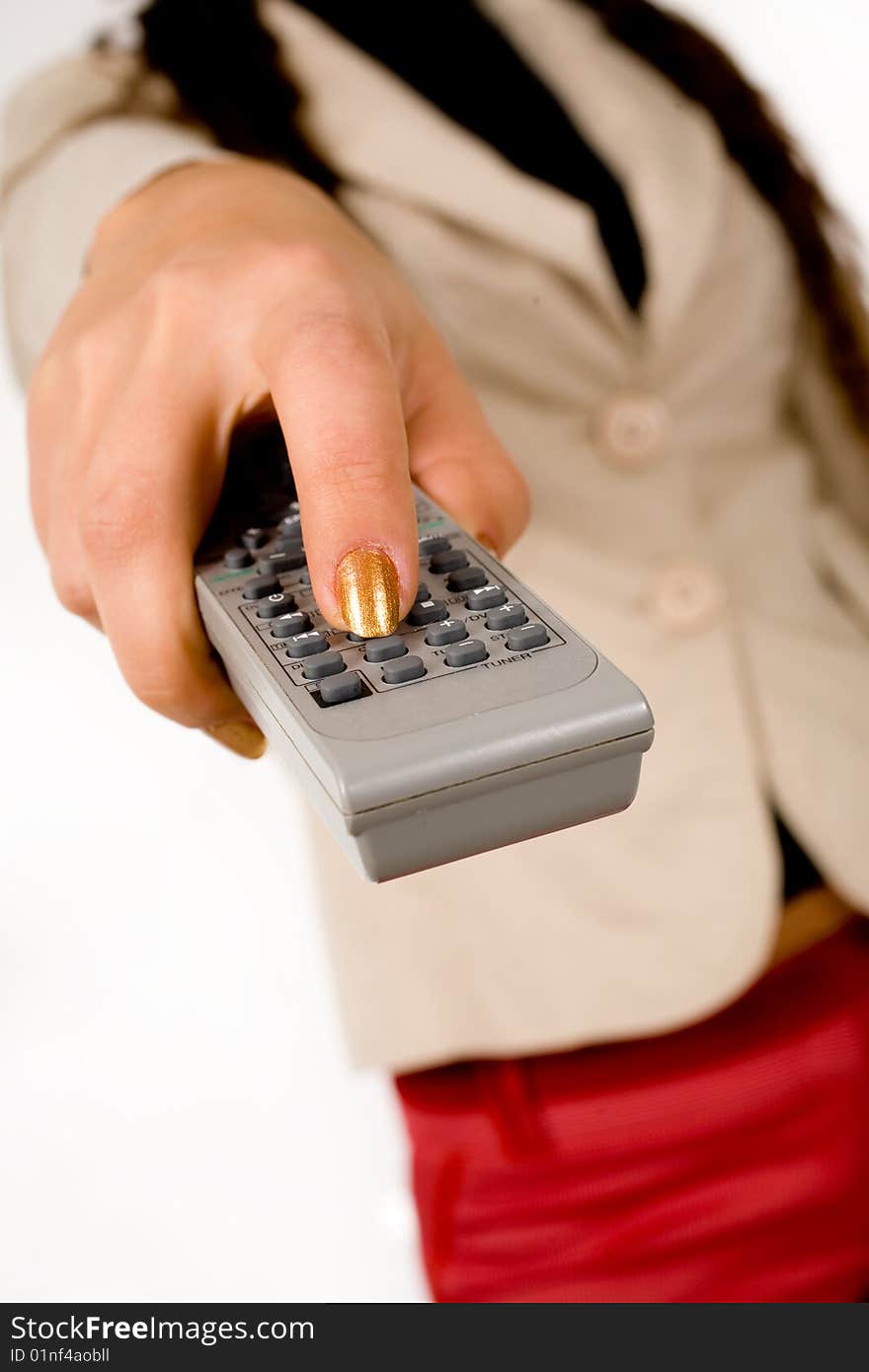 Attractive smiling woman with tv remote inn hands