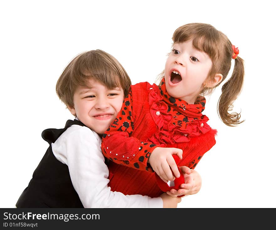 Adorable little boy hugging his sister too hard