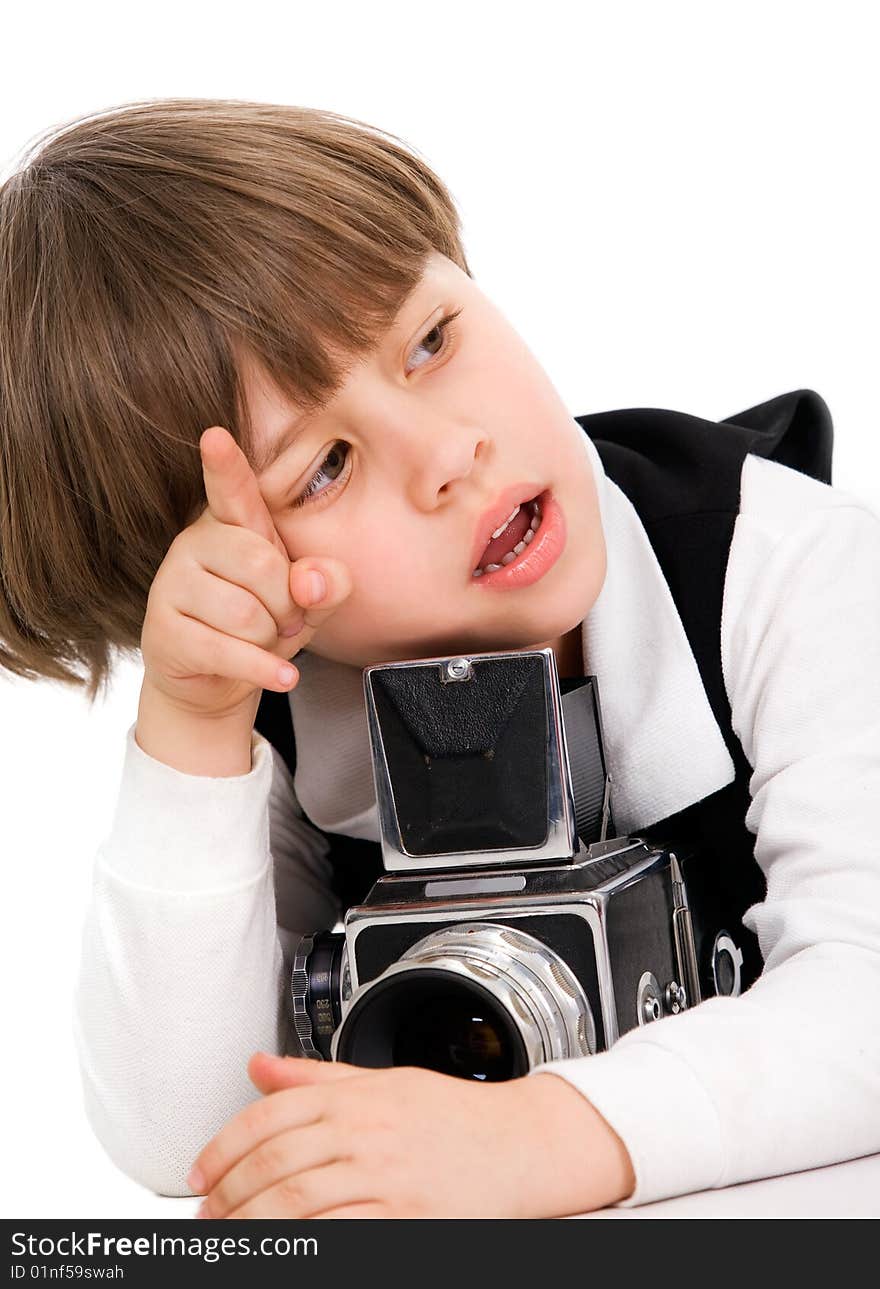 Attractive little boy with photo camera over white. Attractive little boy with photo camera over white