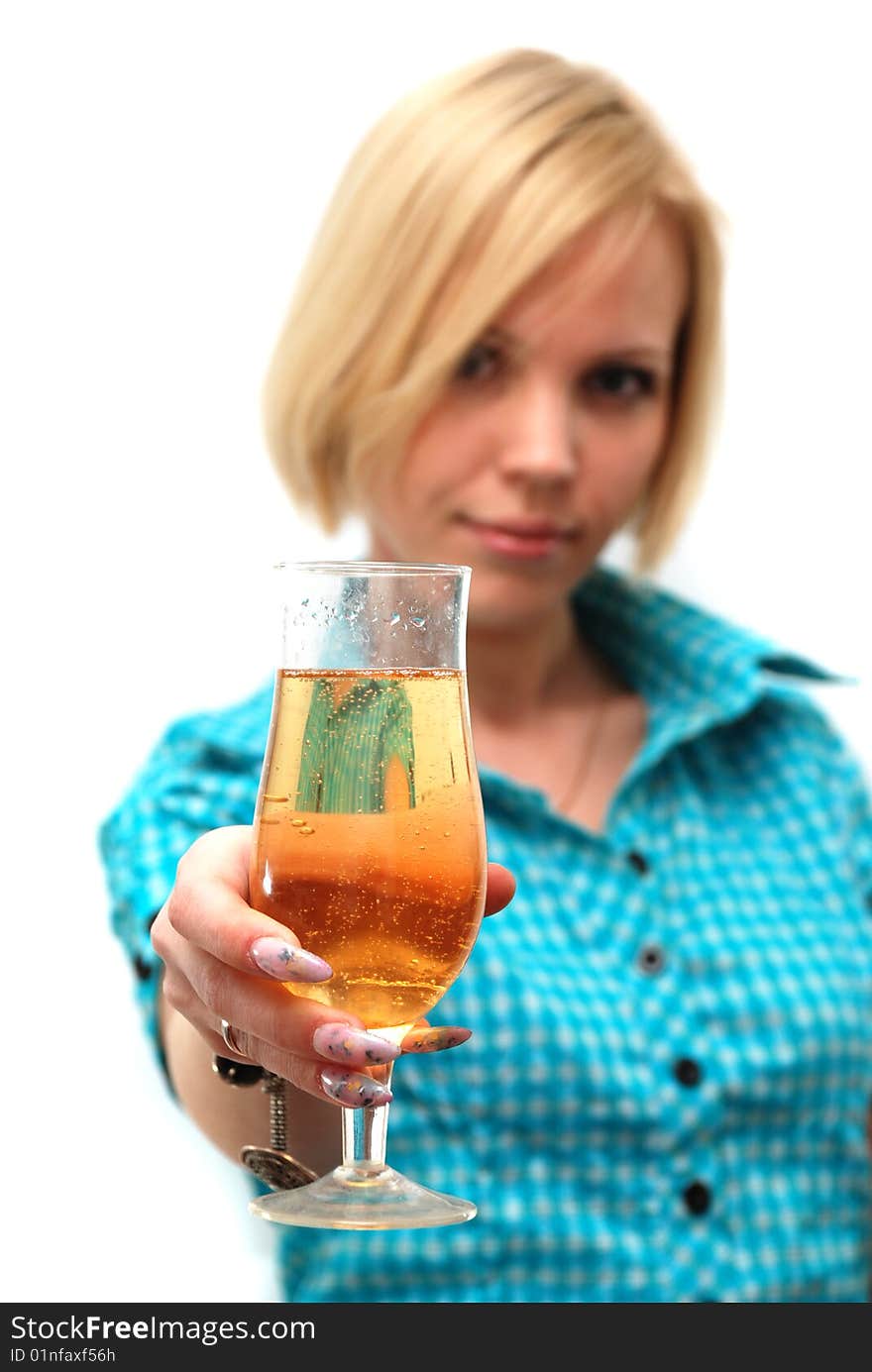 Woman holding a glass of champagne on a white background