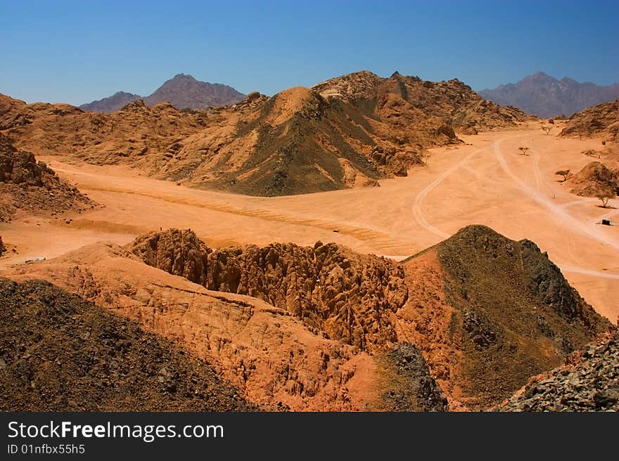 Sinai mountains view - desert and blue sky. Sinai mountains view - desert and blue sky