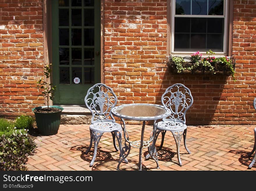 Cafe front with table and chairs