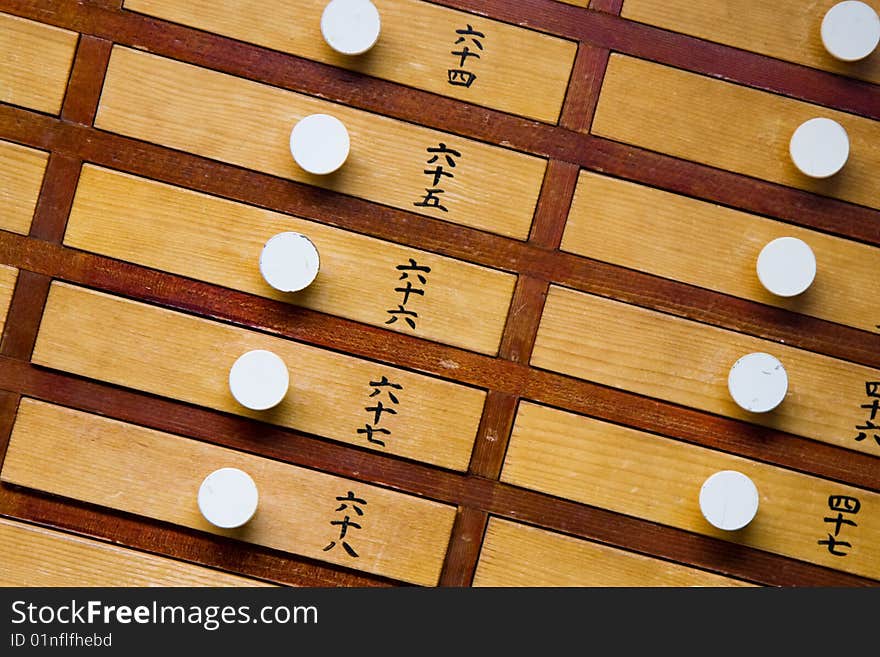 Close up of wooden trays at a Japanese temple