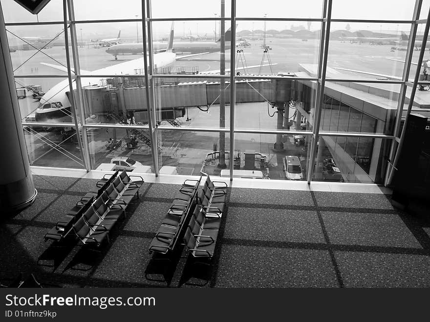 Airplane docked at the airport ready for passengers to board. Airplane docked at the airport ready for passengers to board.