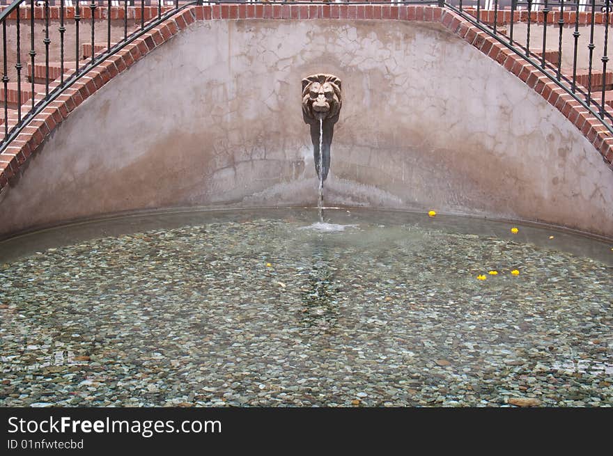 Lion head water fountain in Balboa Park