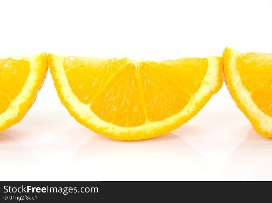 Orange quarters isolated against a white background