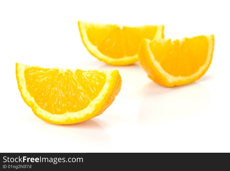 Orange quarters isolated against a white background