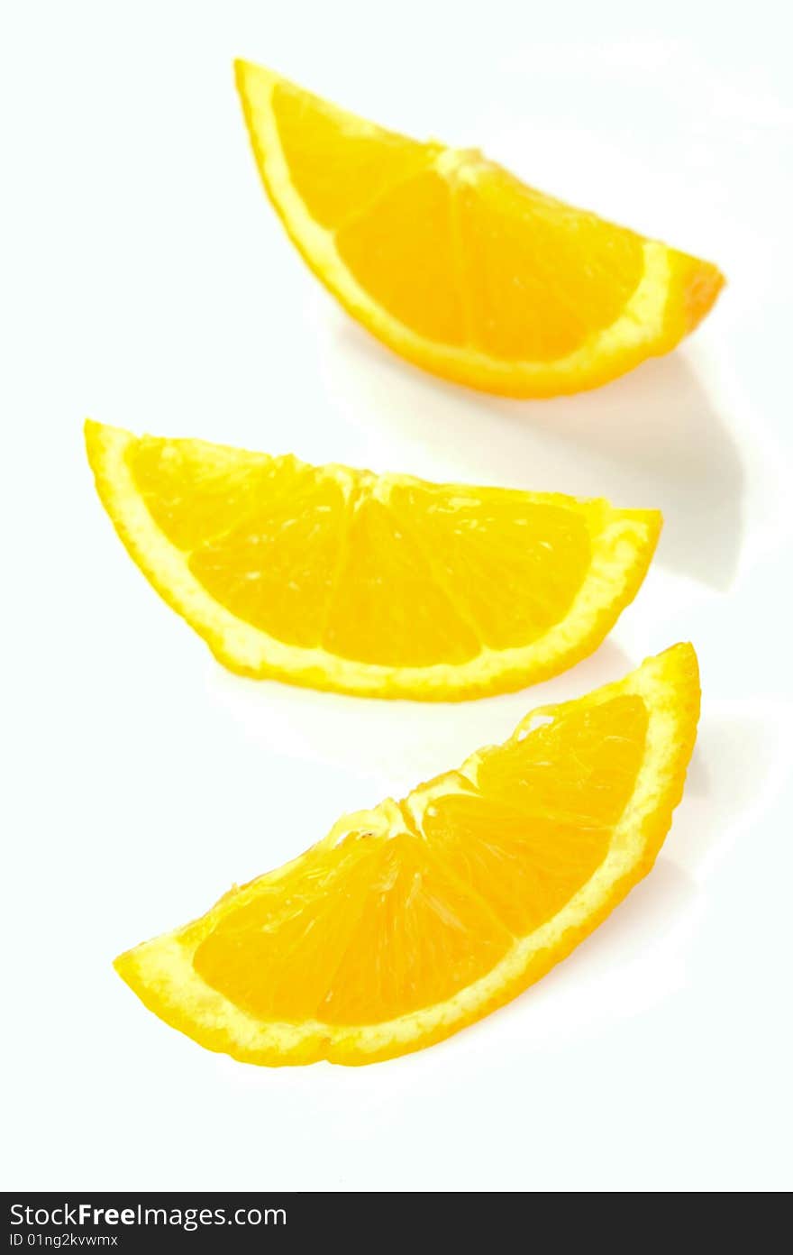 Orange quarters isolated against a white background