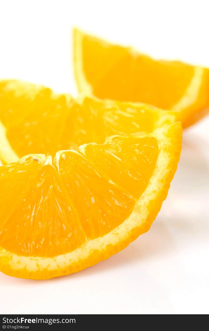 Orange quarters isolated against a white background