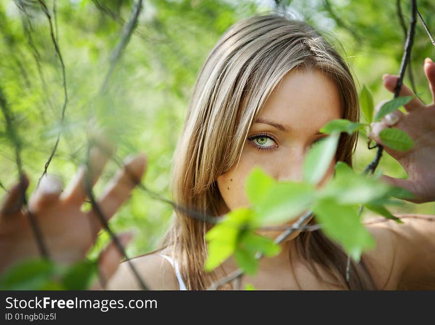 Portrait of a beautiful young lady in natural background