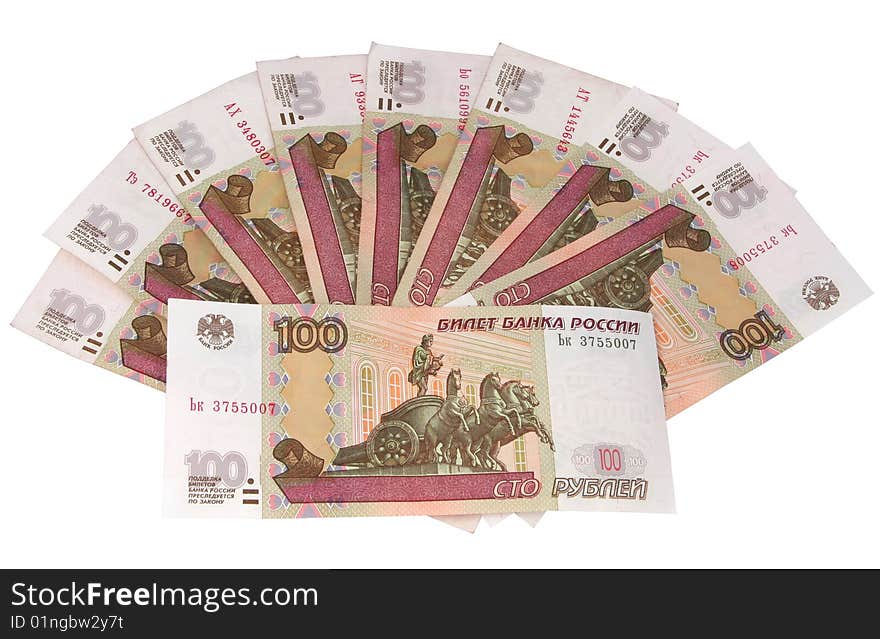 Monetary denominations on hundred roubles lie a fan on a white background. Monetary denominations on hundred roubles lie a fan on a white background