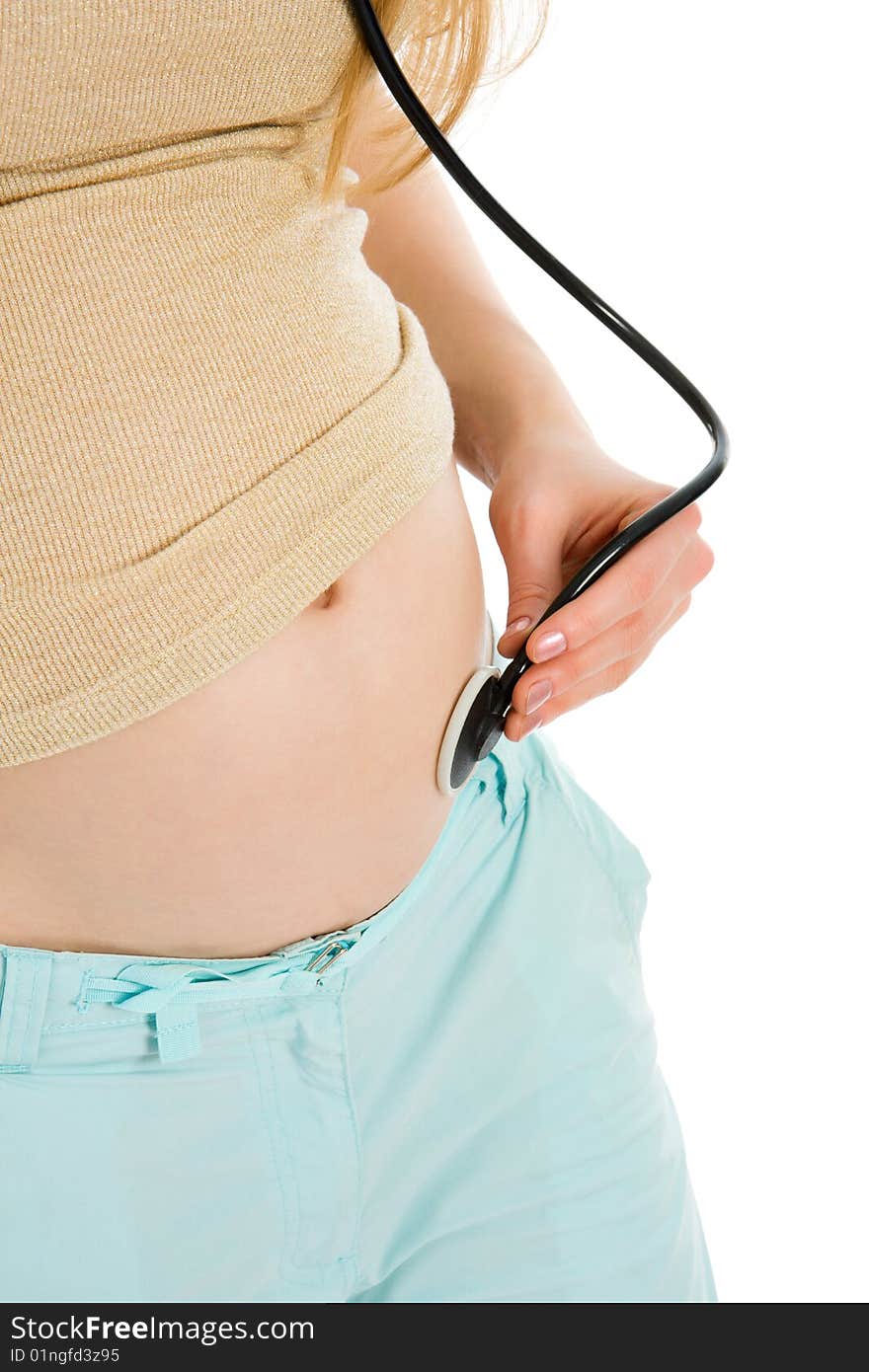 Pregnant Woman Listening To Belly Stethoscope