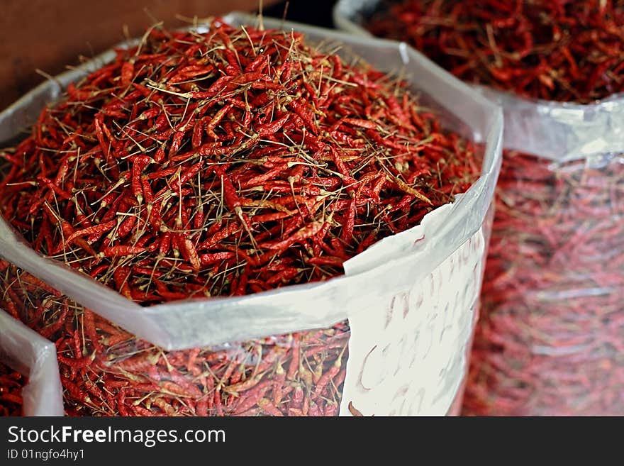 A sack of dried chilli pepper at asian market. A sack of dried chilli pepper at asian market