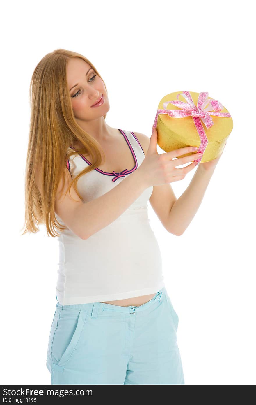 Pregnant woman holding a gift in his hands