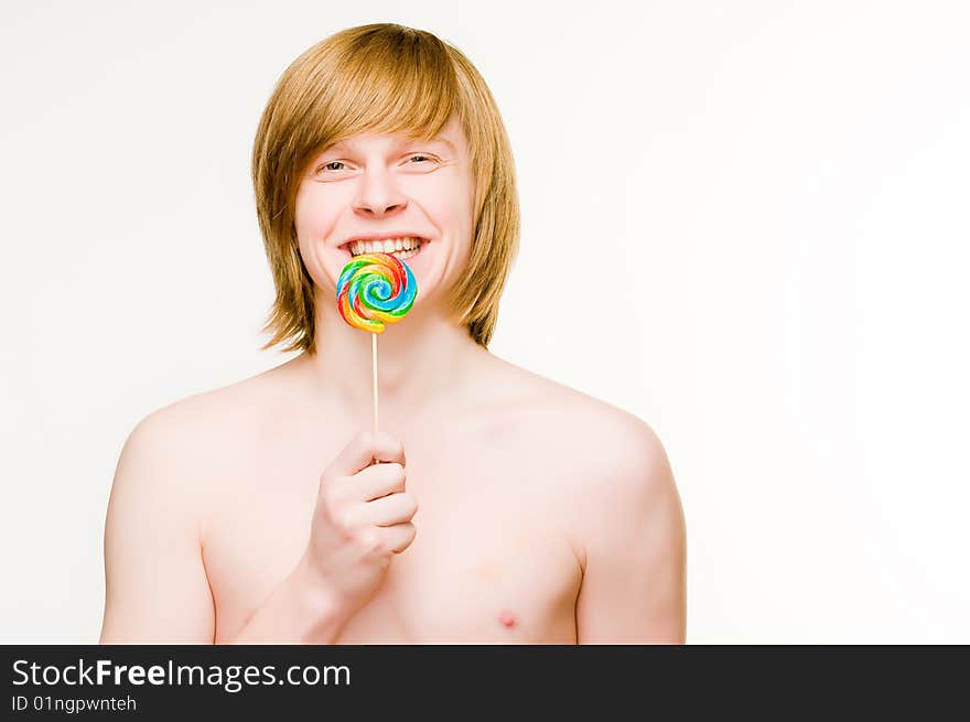 Cheerful Red-haired Man With Lollipop