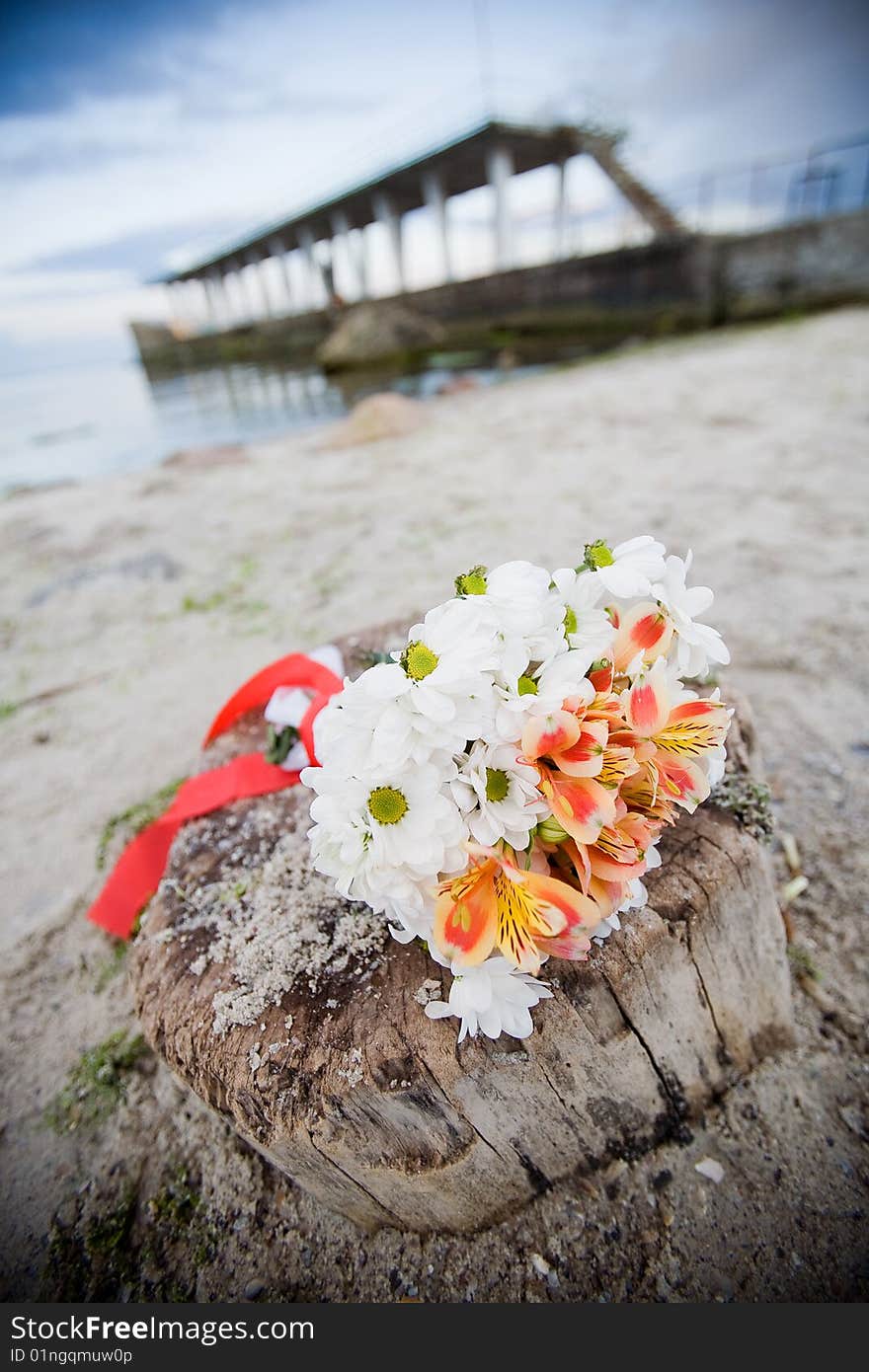 Bridal bouquet outdoors on the beach