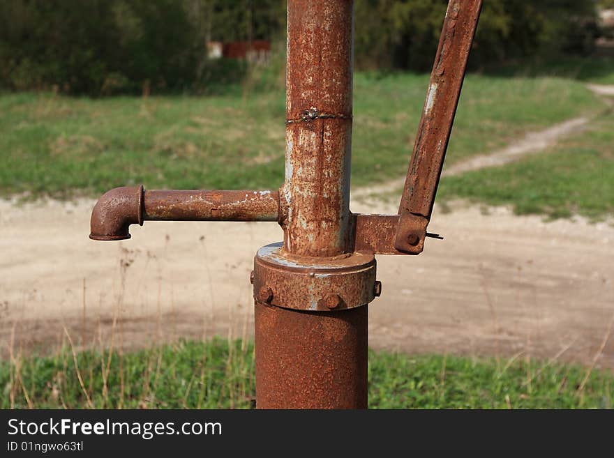 Rusted outdoor water pump-tap