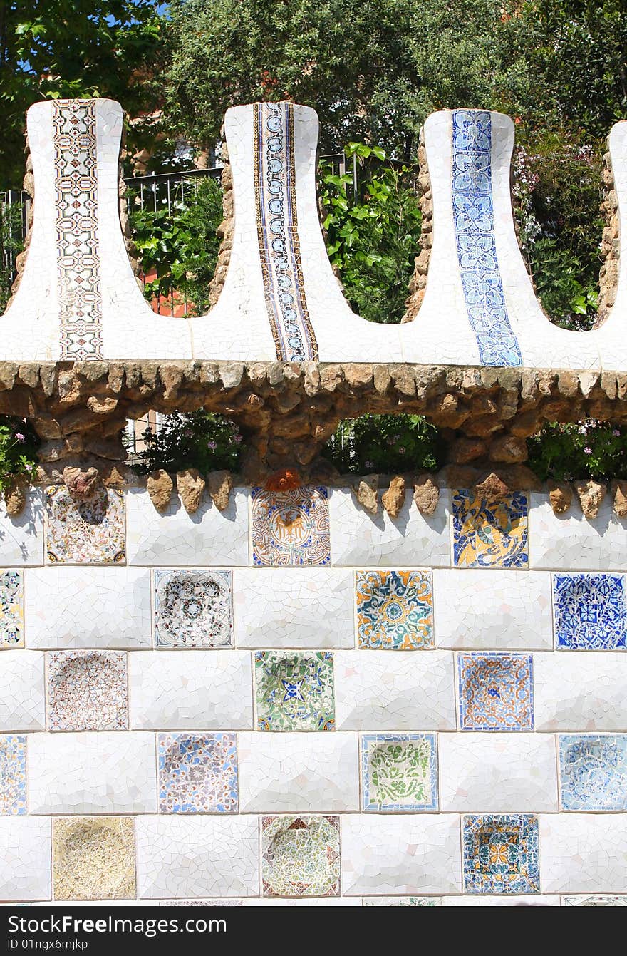 Details of colorful design of mosaic in Park Guell, Barcelona, Spain