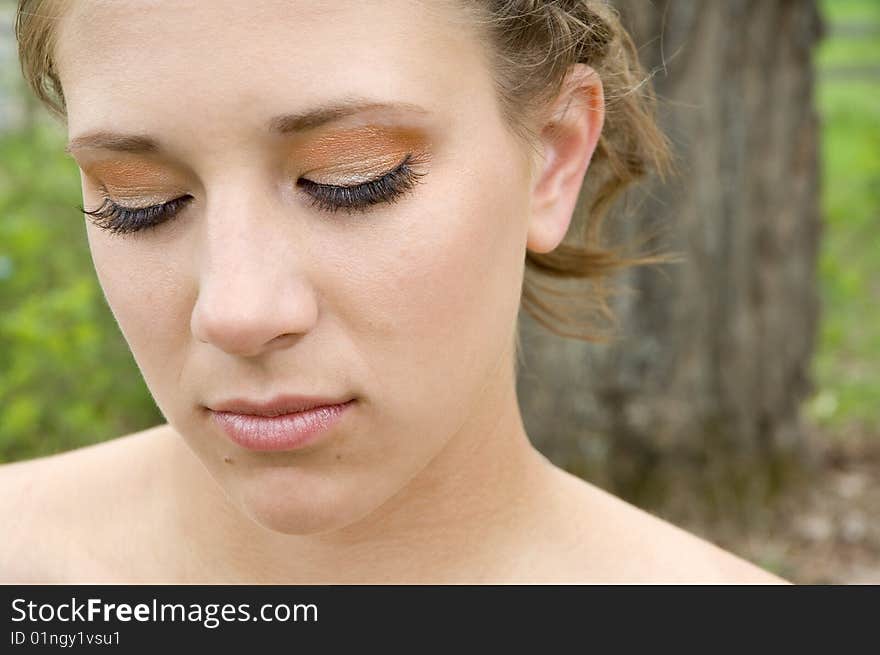 Beautiful young woman in a forest. Beautiful young woman in a forest