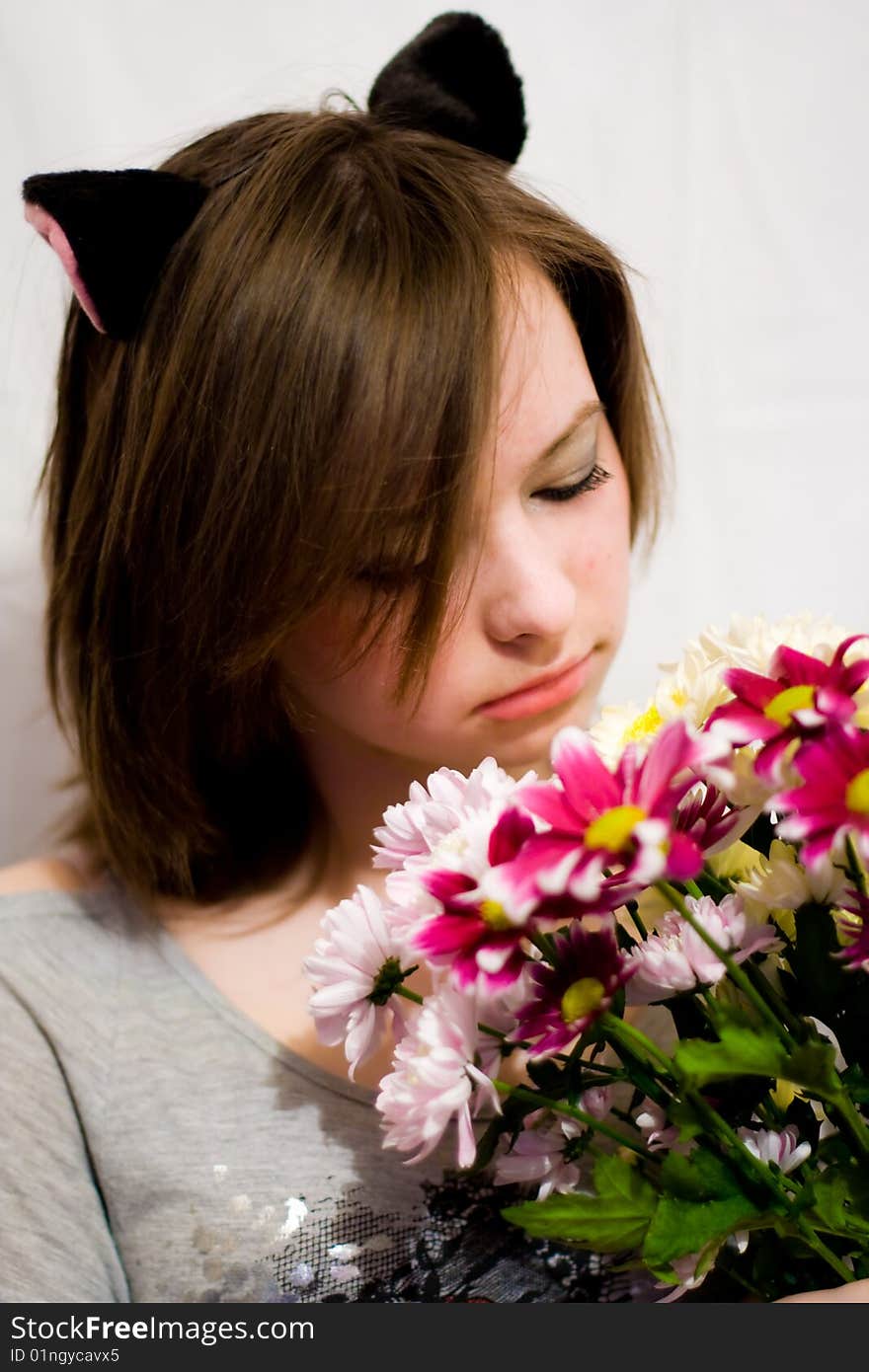 Beautiful girl with bunch of flowers. Beautiful girl with bunch of flowers