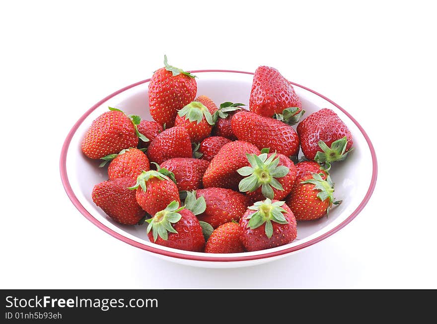 Strawberry in plate on white background