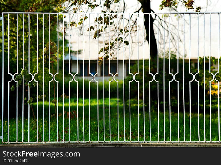 Detail of white metal fence