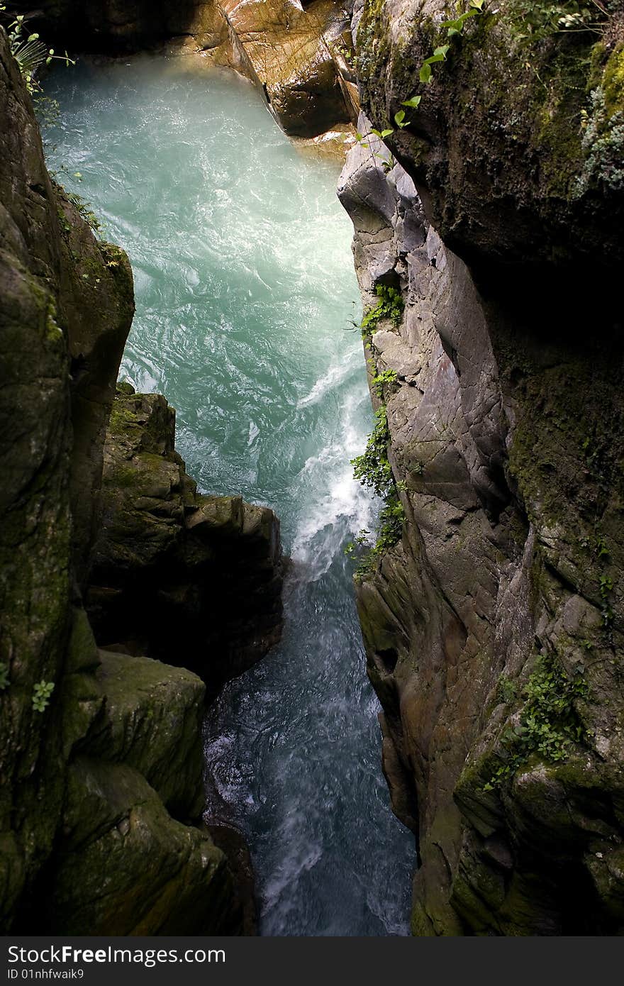 Scroll of a stream between the rocks. Scroll of a stream between the rocks