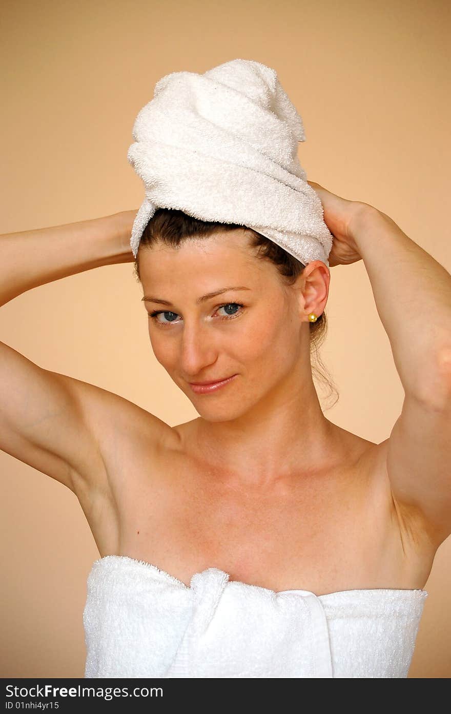 Attractive woman with turban after taking a shower. Attractive woman with turban after taking a shower