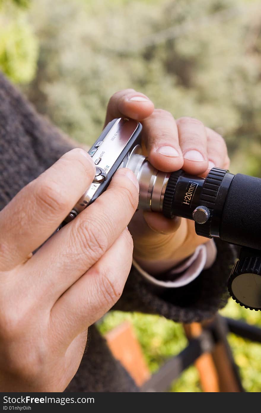 Scientist observing through his microscope or optical instruments. Scientist observing through his microscope or optical instruments