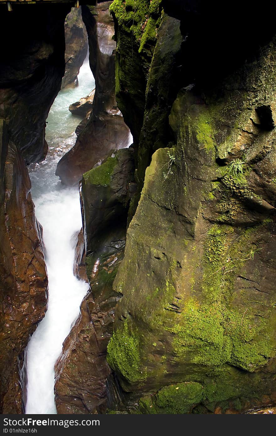 Scroll of a stream between the rocks. Scroll of a stream between the rocks