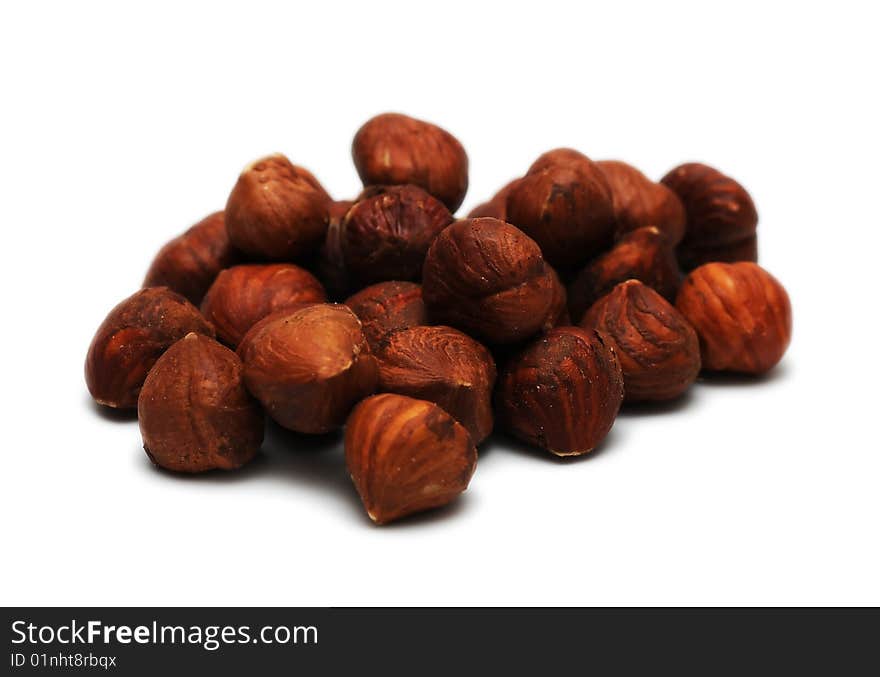 Hazelnuts on white background