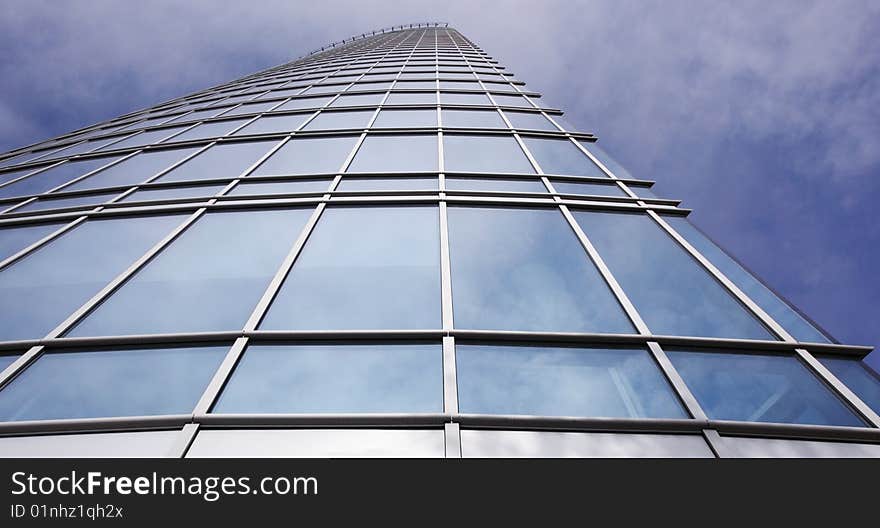 Skyscraper on a background of blue sky