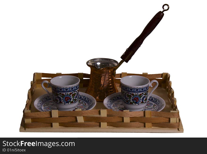 Set from two cups and a coffee maker on a tray