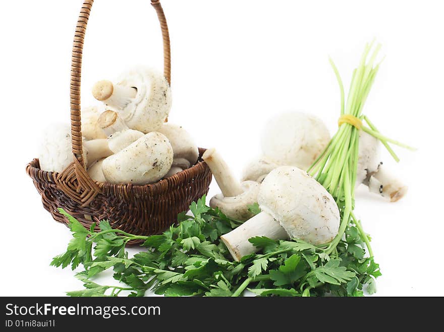 Basket, parsley and mushrooms