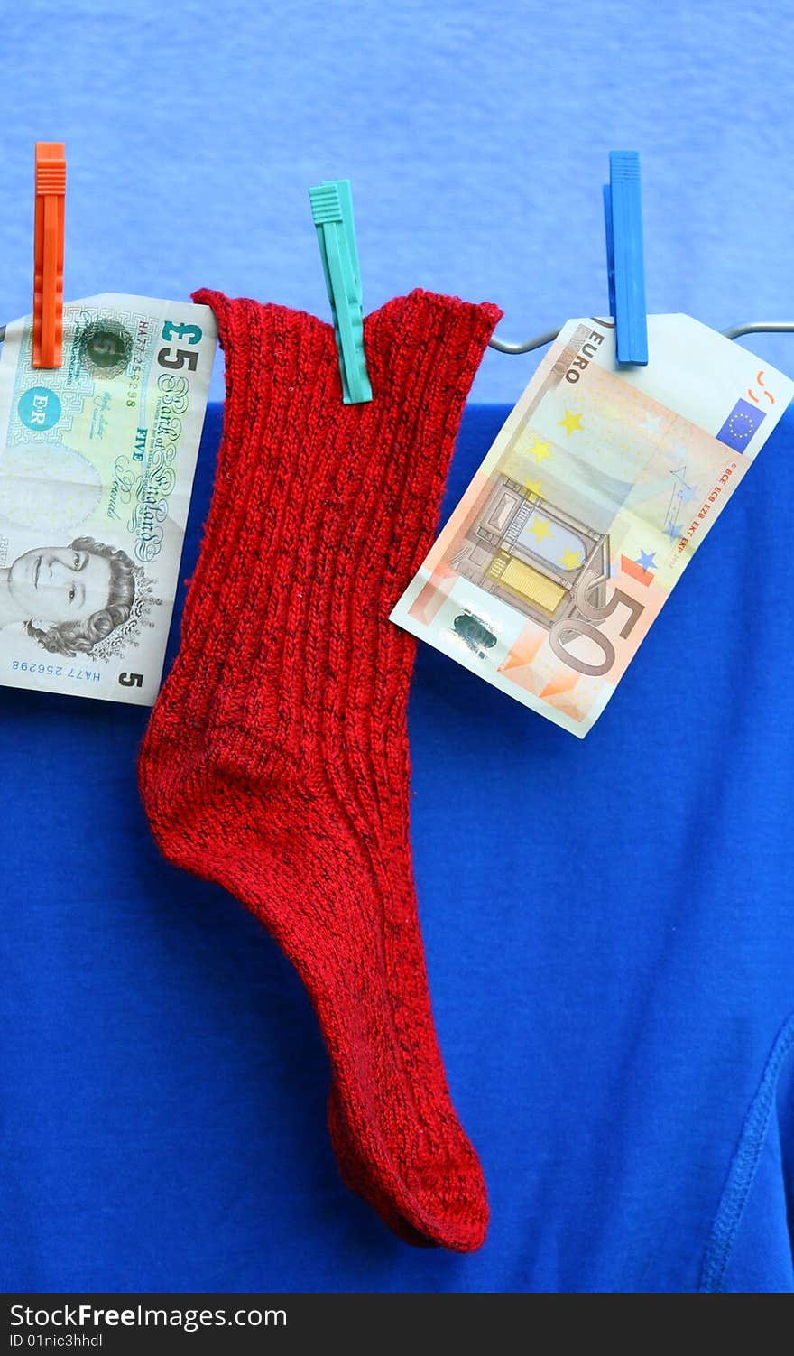 Red sock and two banknotes. Red sock and two banknotes