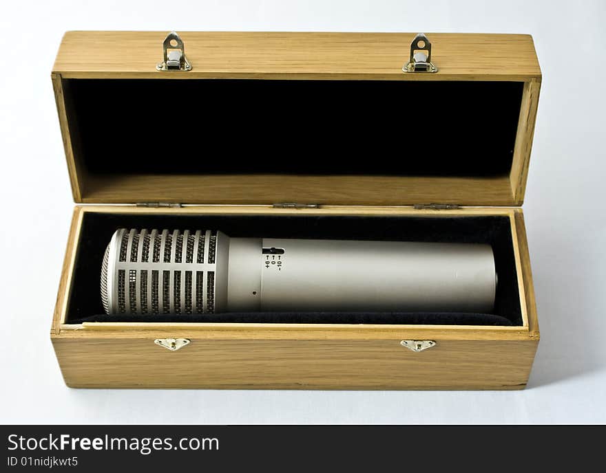 Studio microphone in a wooden case