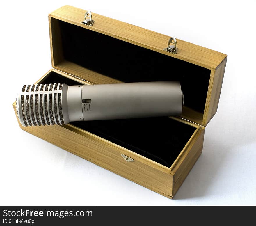 Studio microphone in a wooden case