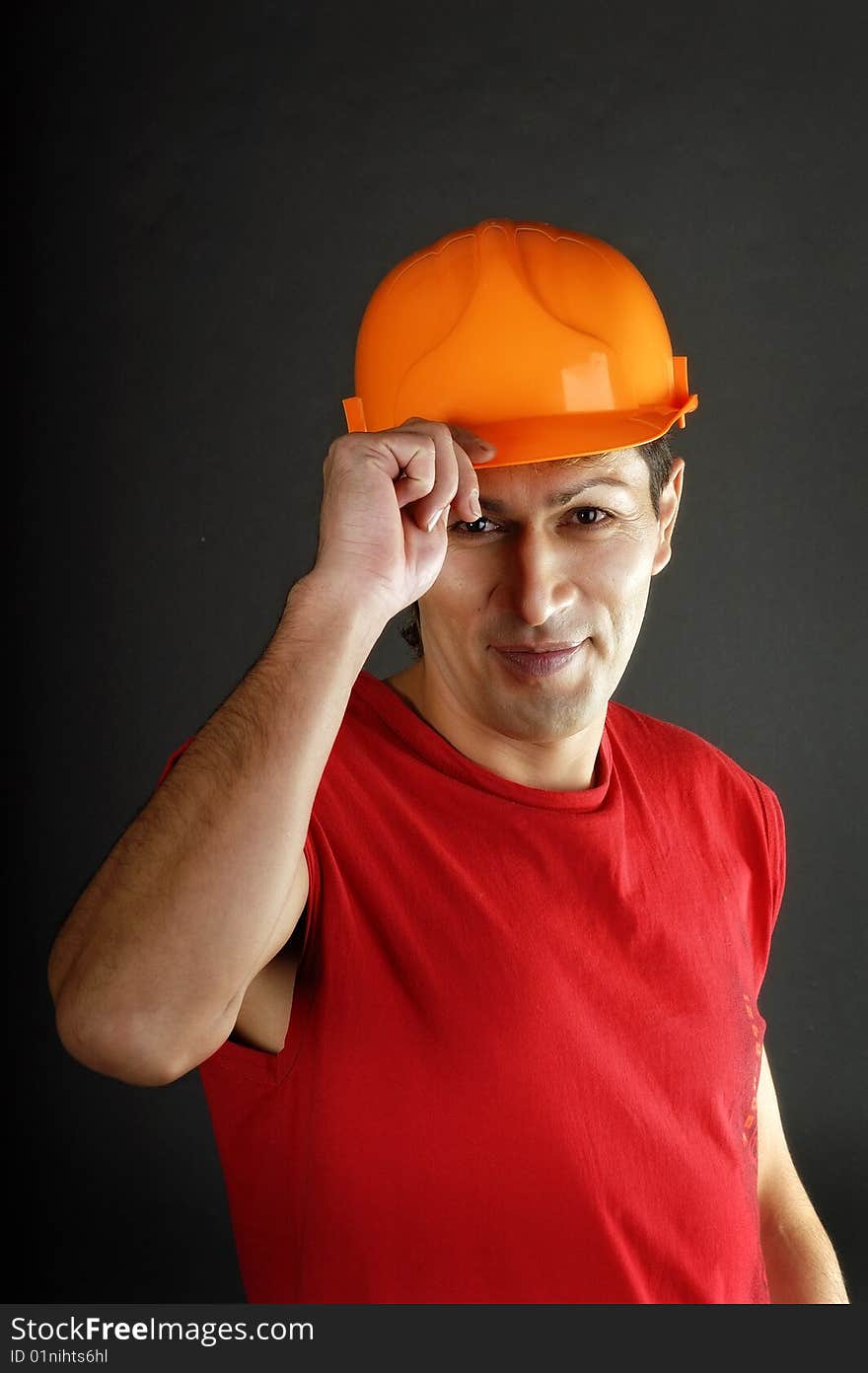 Man in red tanktop and in defensive send. Man in red tanktop and in defensive send