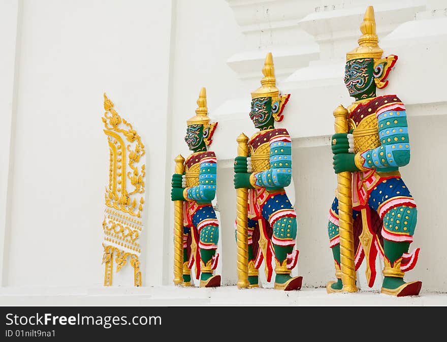 Giant guardian statues in Thai style