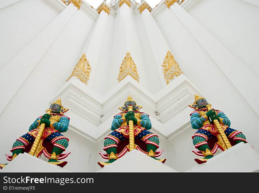 Giant statues around pagoda of Wat Pitchayatikaram, Bangkok, Thailand. Giant statues around pagoda of Wat Pitchayatikaram, Bangkok, Thailand