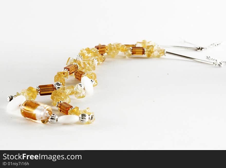 Yellow necklace with silver isolated