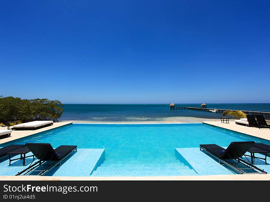 Furniture next to pool near of beach. Furniture next to pool near of beach