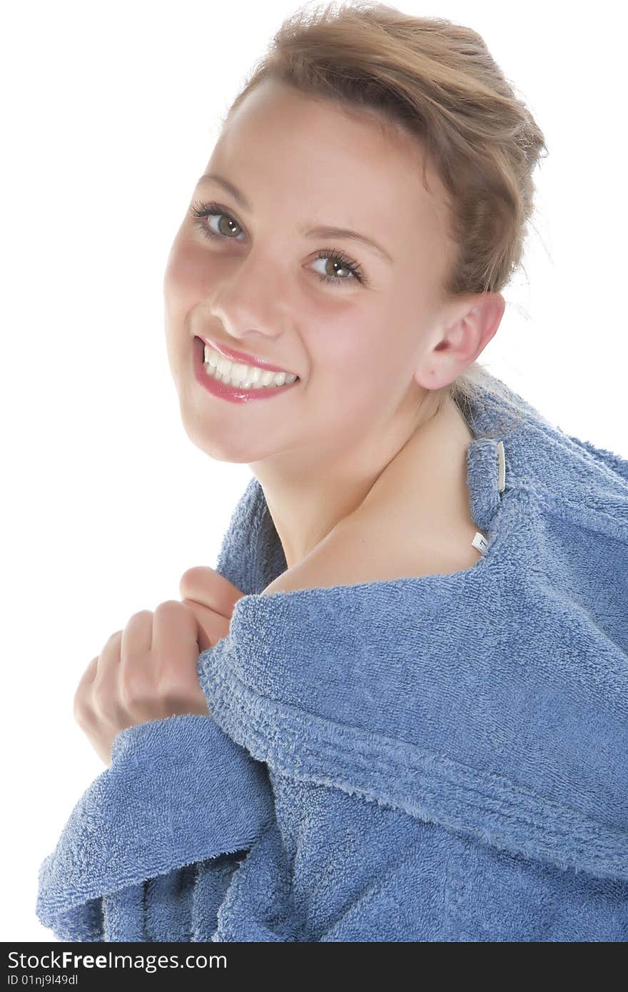 Smiling Woman In Bathrobe. Isolated Over White Bac