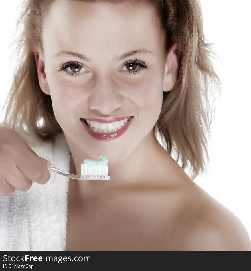 Girl who wash their teeth on white background