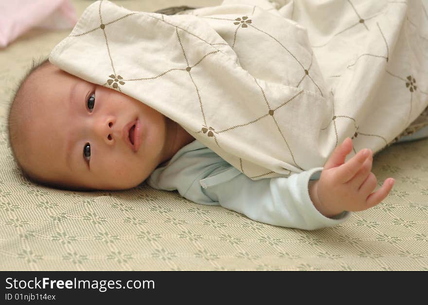 It is a cute chinese baby. he is 5 months. It is a cute chinese baby. he is 5 months.