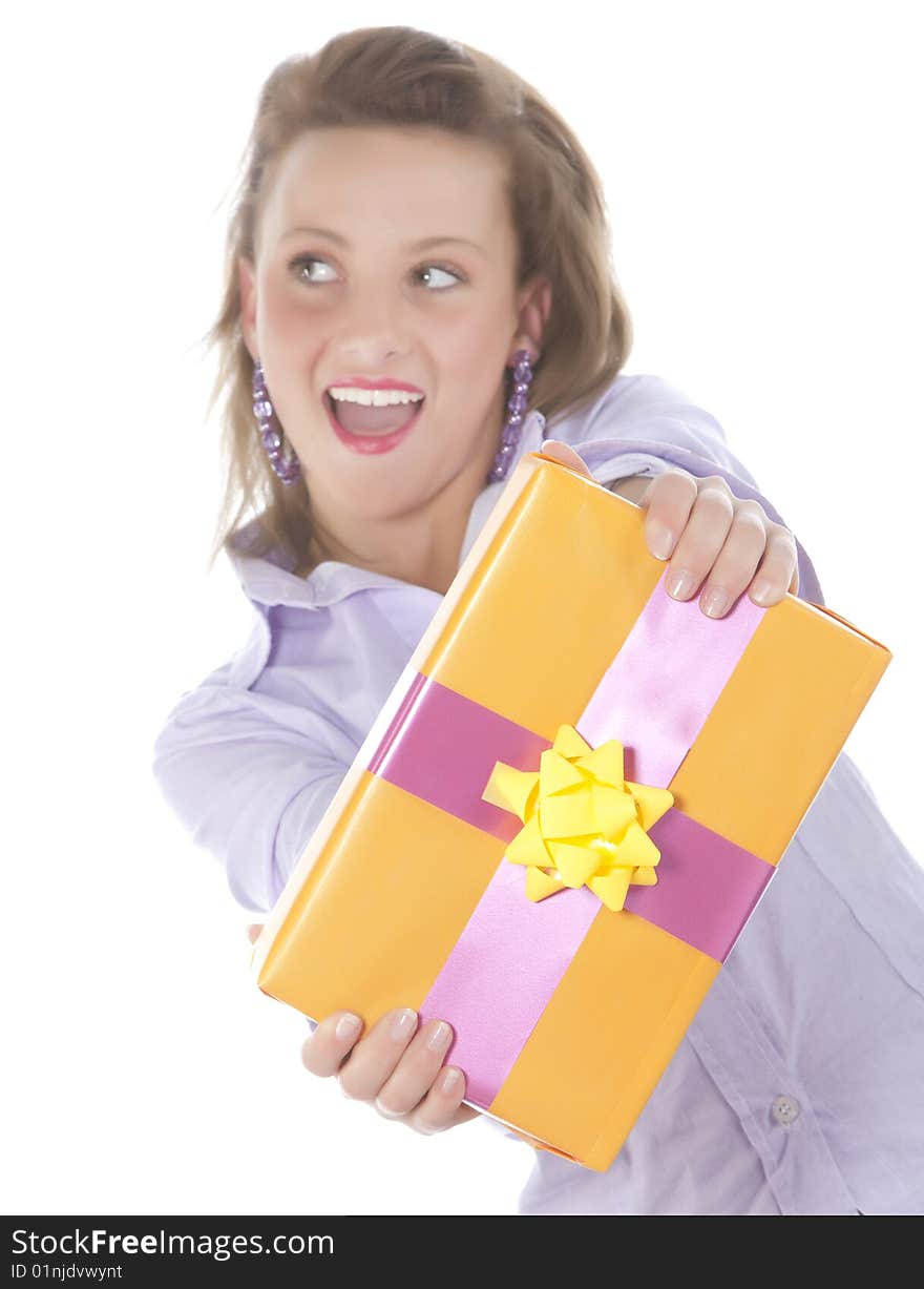 Beautiful young smiling girl with present