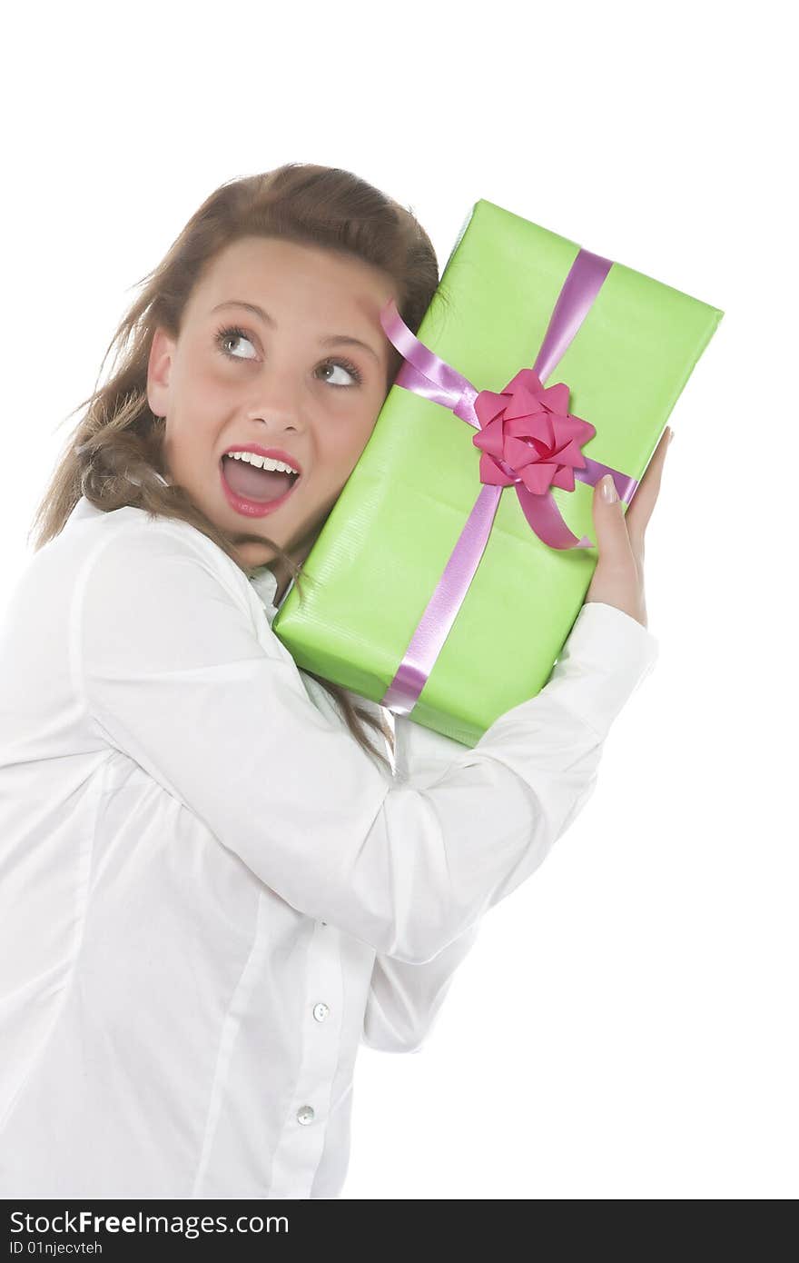 Beautiful young smiling girl with present