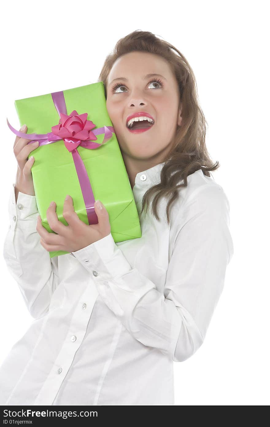 Beautiful young smiling girl with present